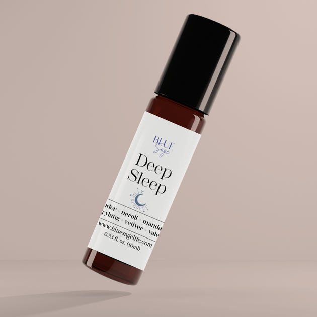 Roll-on bottle labeled 'Deep Sleep' by Blue Sage on a beige background