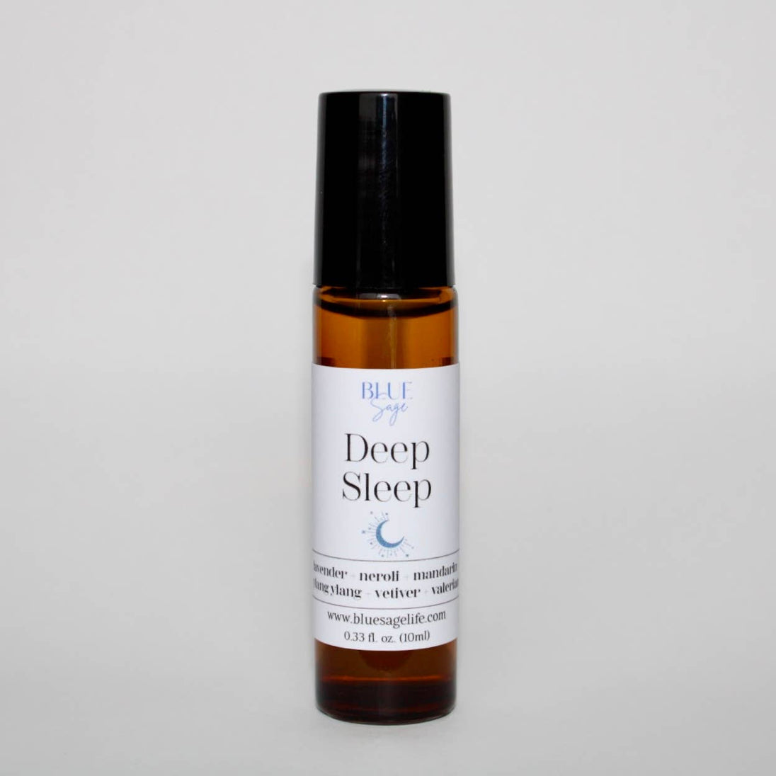 Roll-on bottle labeled 'Deep Sleep' on a light gray background