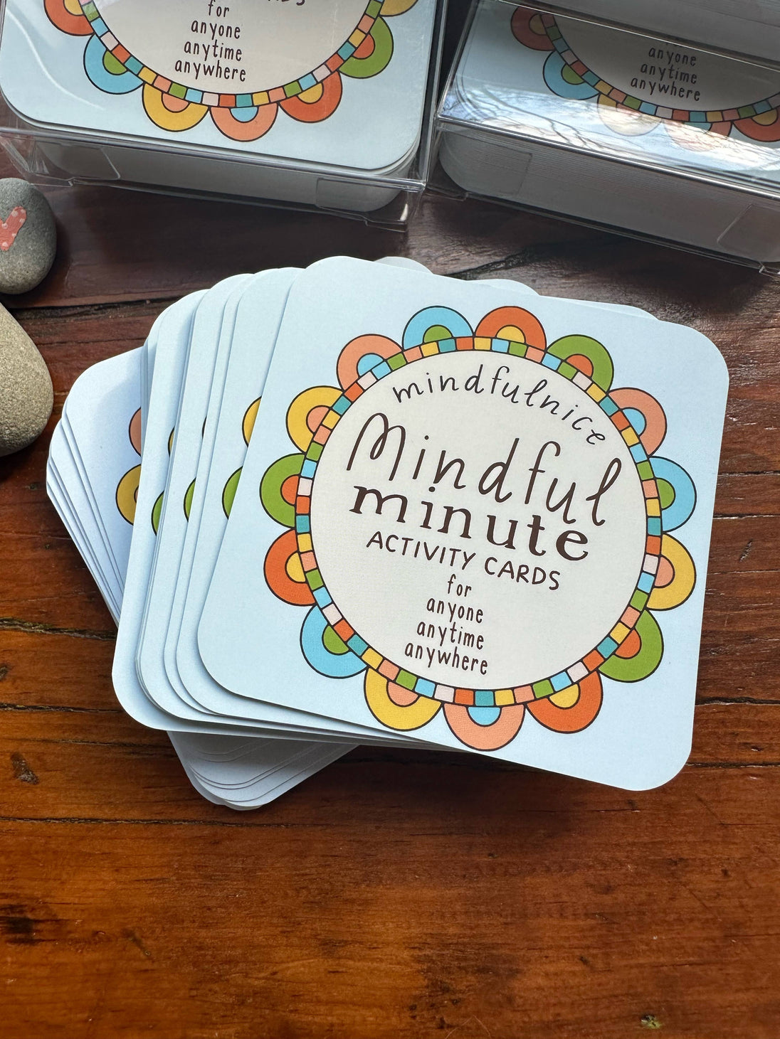 Stack of 'Mindful Minute Activity Cards' on a wooden surface