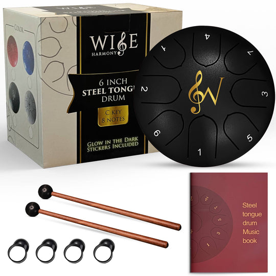 Wise Harmony steel tongue drum set with packaging, drum, mallets, and music book on a white background