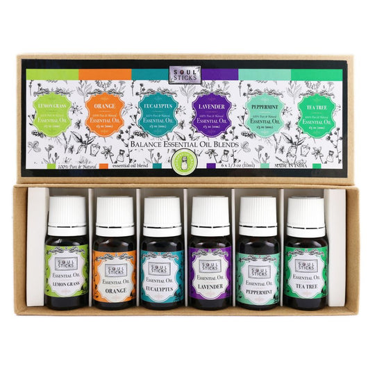 A box containing six 10 mL bottles of pure essential oils in different colors, labeled with their respective scents and benefits.